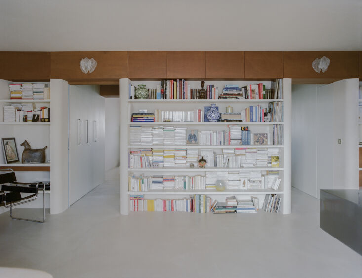 two openings lead to separate bedrooms—a main bedroom and children\2\1 23