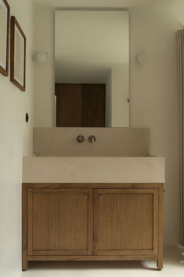 the cabinet is custom by charly. the wall sconces are from zangra in belgium. b 25