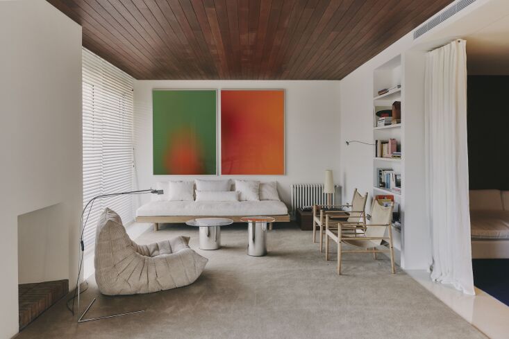 open to the dining area is the living room, awash in neutral colors except for 22
