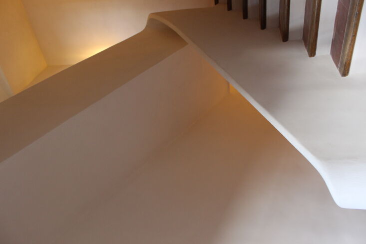 the architect and designers fully transformed the staircase that runs between t 25