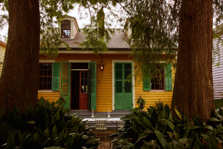 the cottage, with sweet green shutters. it\2\17;s tucked behind a tropic 17