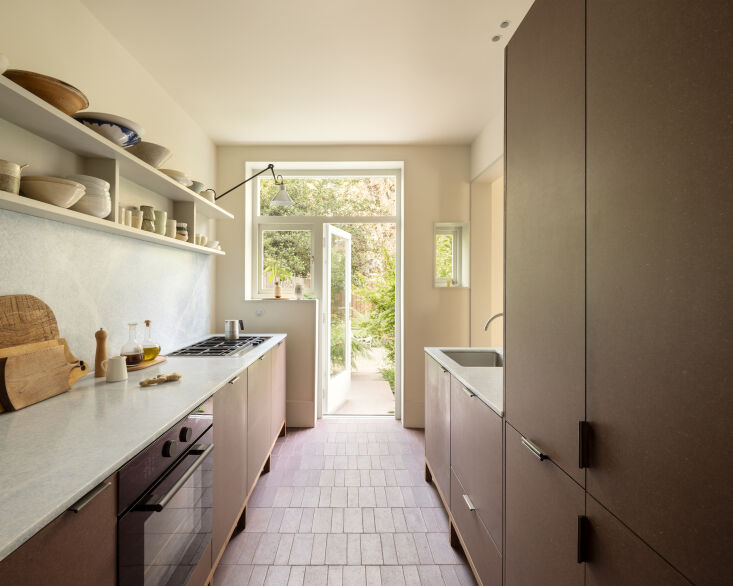 the couple opted for brick colored valchromat cupboards with walnut feet, & 35