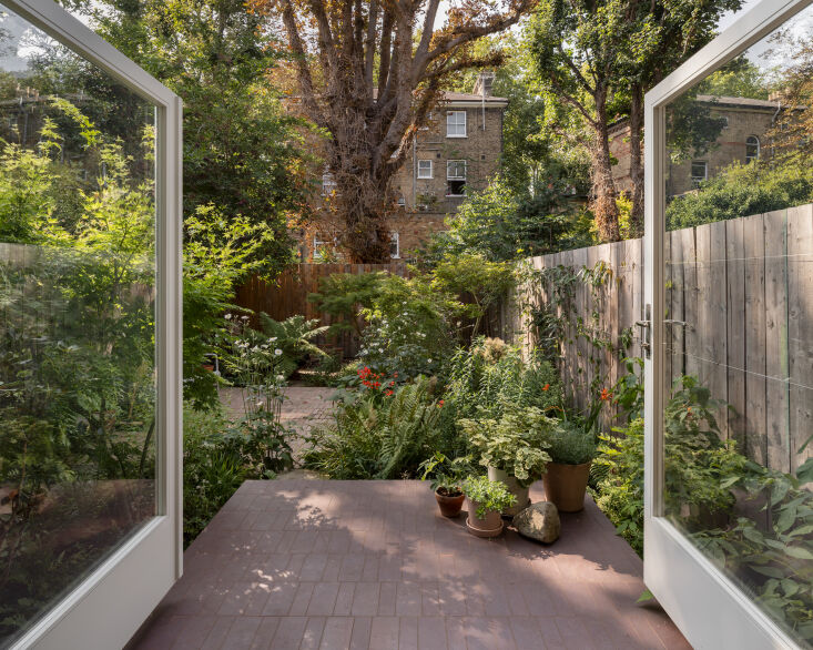 in the backyard, jody and amalia recycled old materials that they no longer nee 36