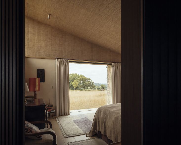 the main bedroom is finished with a rattan ceiling. 28