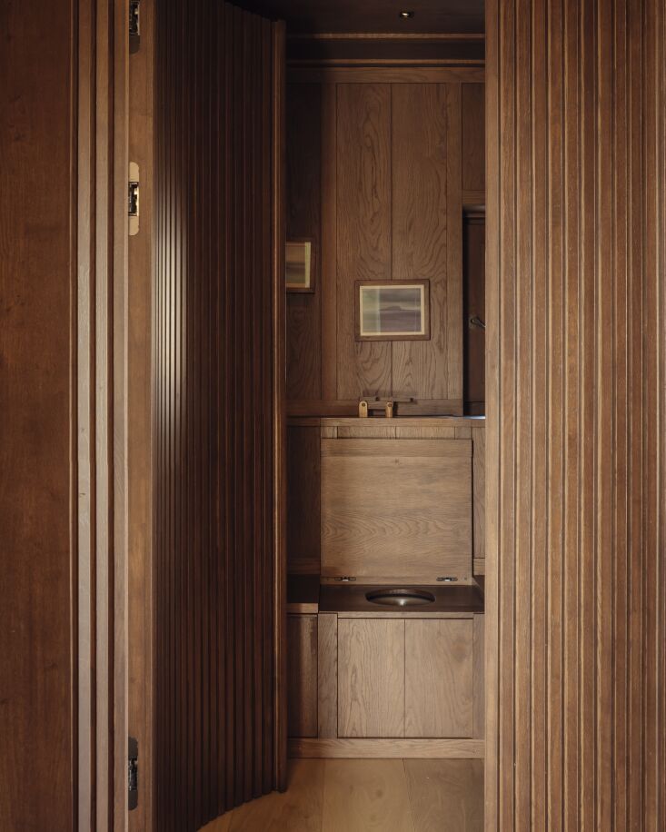 a wc with a hand carved wood sink made from macracarpa/monterey cypress sourced 29