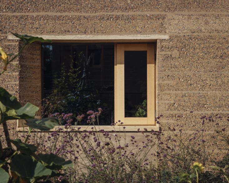 up to one meter thick in places, the unstabilized rammed earth walls carve out 21