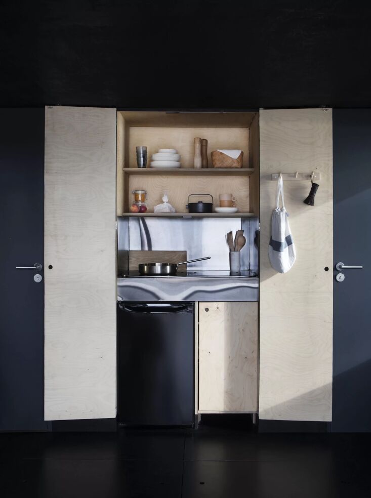 well equipped kitchenettes disappear behind closed doors when not in use. majam 21