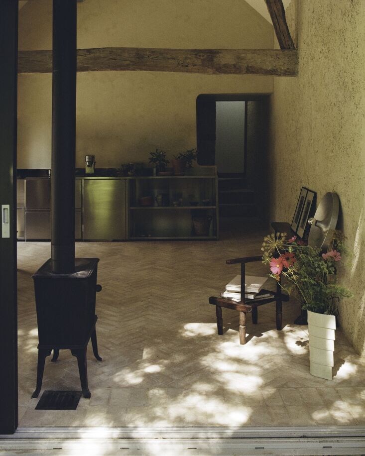 the main open space serves as both living/studio area with an open kitchen. 20