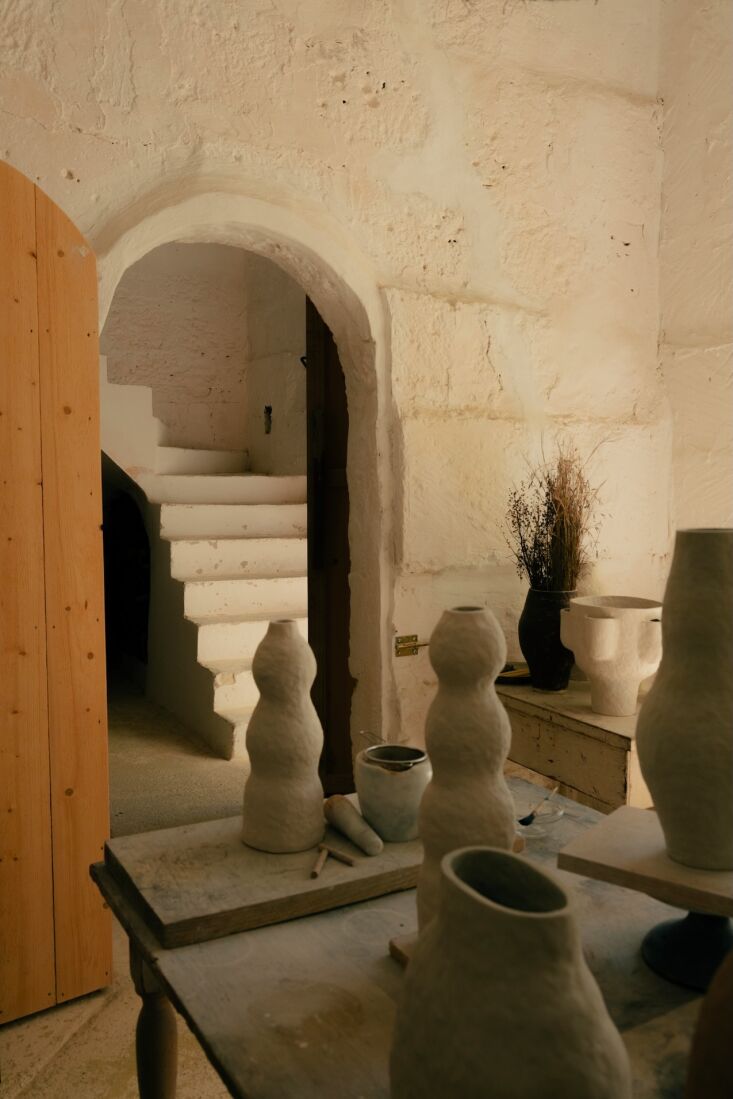 the studio\2\17;s arched entry, newly carved out of the existing limesto 22
