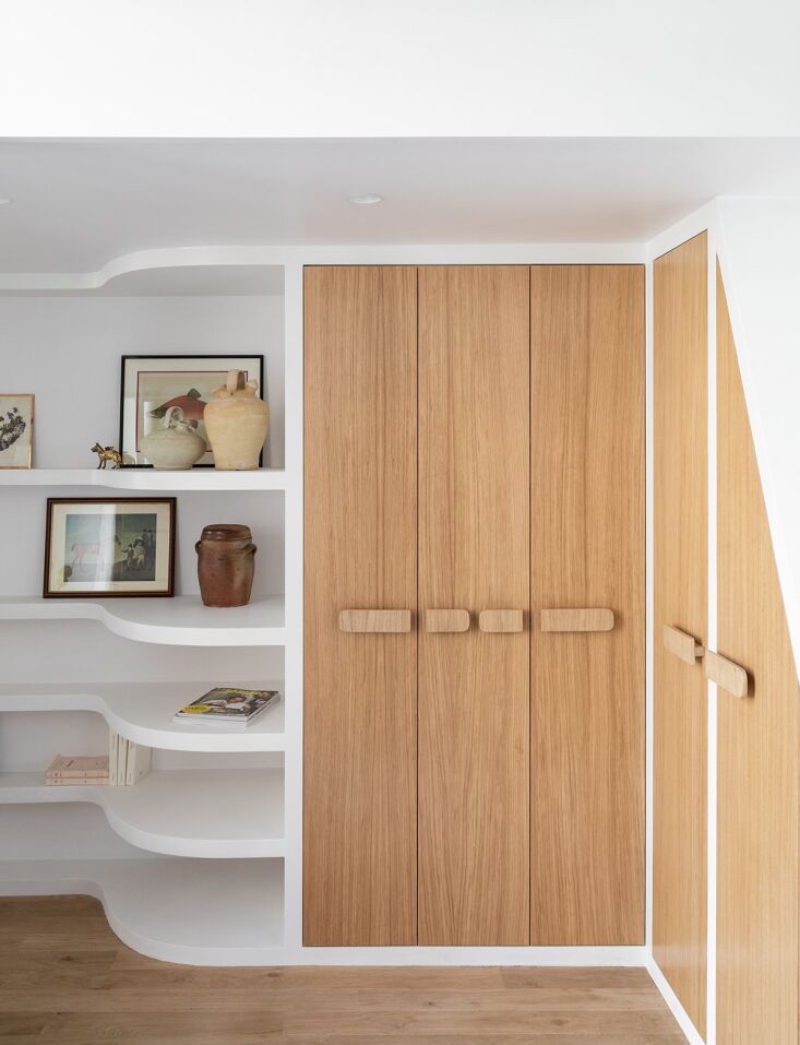 curved walls soften the apartment\2\17;s boxy shell. borgia designed cus 20
