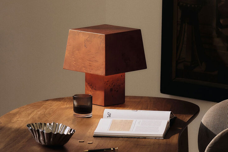 the ferm living burl table lamp is made entirely of dark stained poplar burl th 18