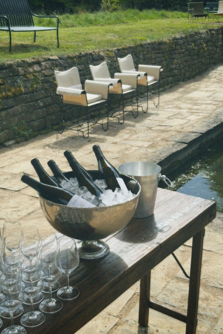 a pond side ice bucket and glasses at the ready. 26