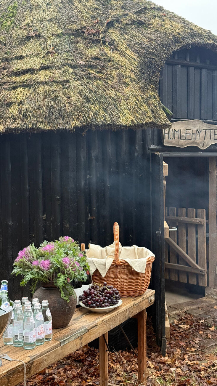 an autumnal gathering takes place between an indoor location—the barns on the 24