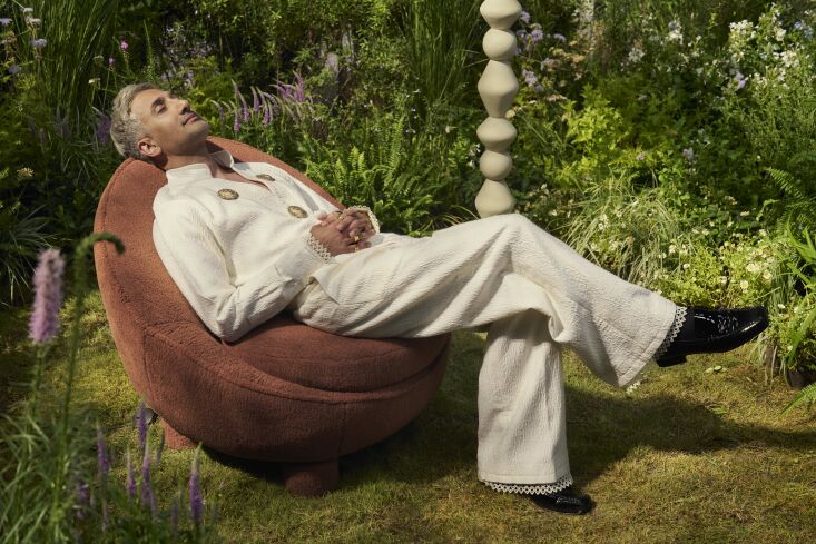 Tan at rest on his Rumi Chair.