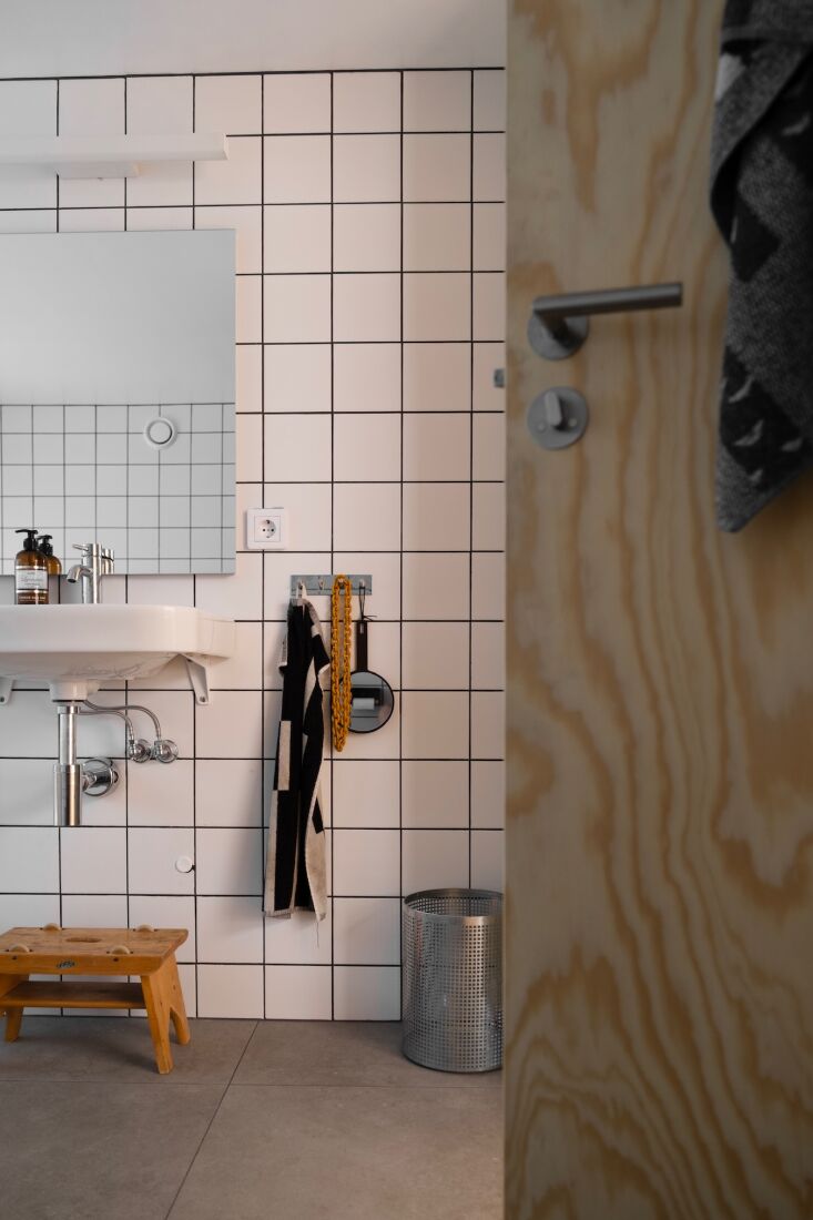 classic, affordable square white tiles and black grout in the main bathroom. by 27