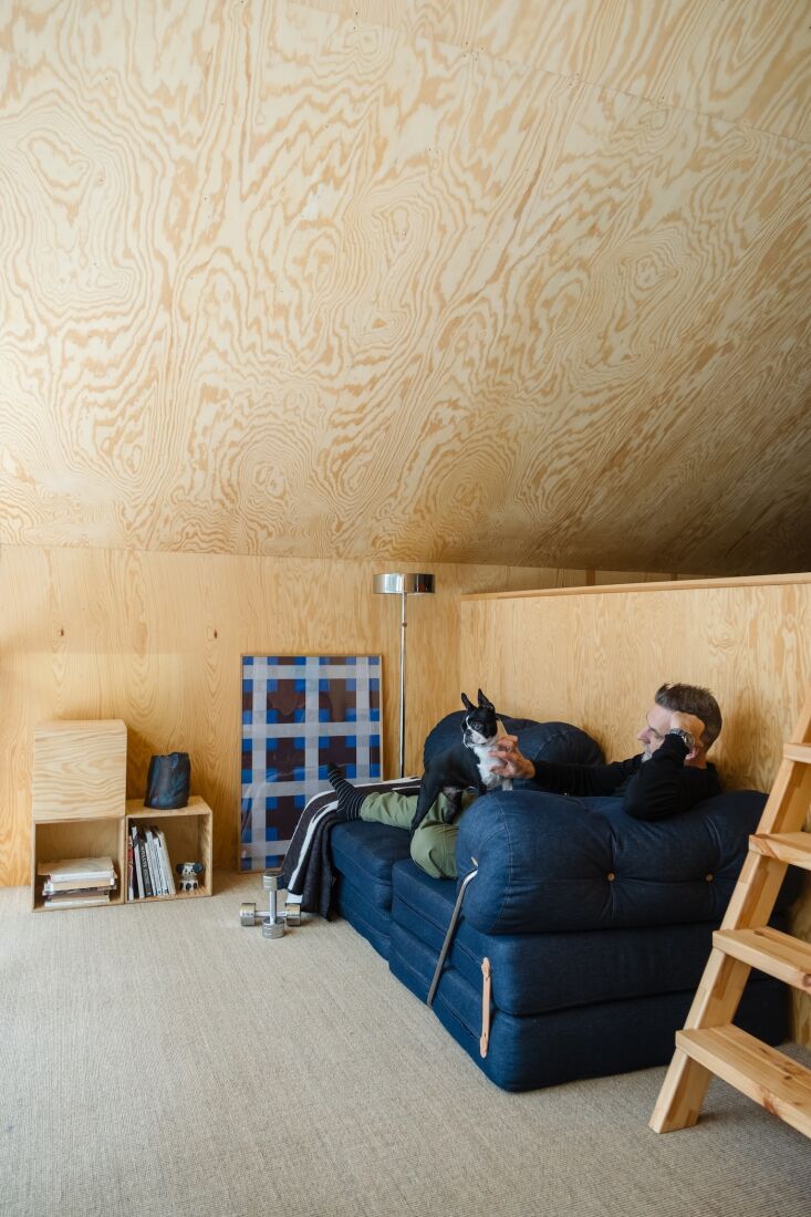 the mezzanine serves as a second hang out spot—so that even when the house is 28