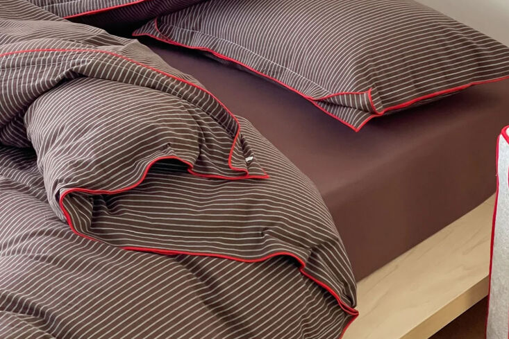 from ever lasting, the arthur pinstripe bedding set comes in brown or black, bo 23