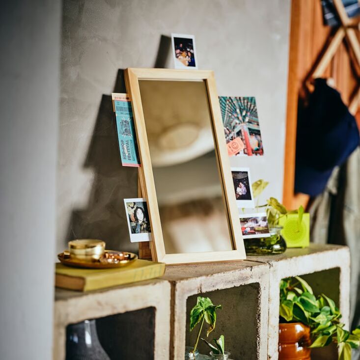 the smaller pine kompishäng mirror, \$\29.99, is the perfect spot for mementos. 20