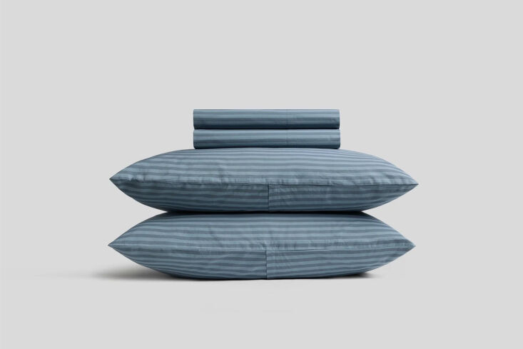 the percale sheet set at parachute comes in four shades of stripes; \$\264 \$3\ 25