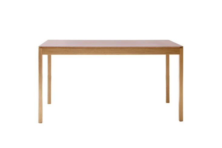 designed by ola kukkasniemi, the wooden foldup folding table is super narrow an 24