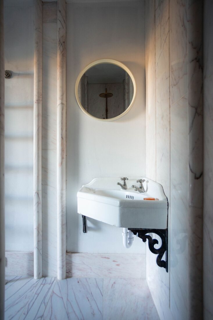 slabs of rose aurora marble—which adam singled out as affordable—partially 27
