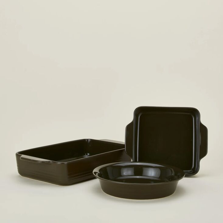 Black bakeware? Look again: This stoneware set from Hawkins New York is actually a deep, dark olive—and looks chic set right on the table. Shop now.