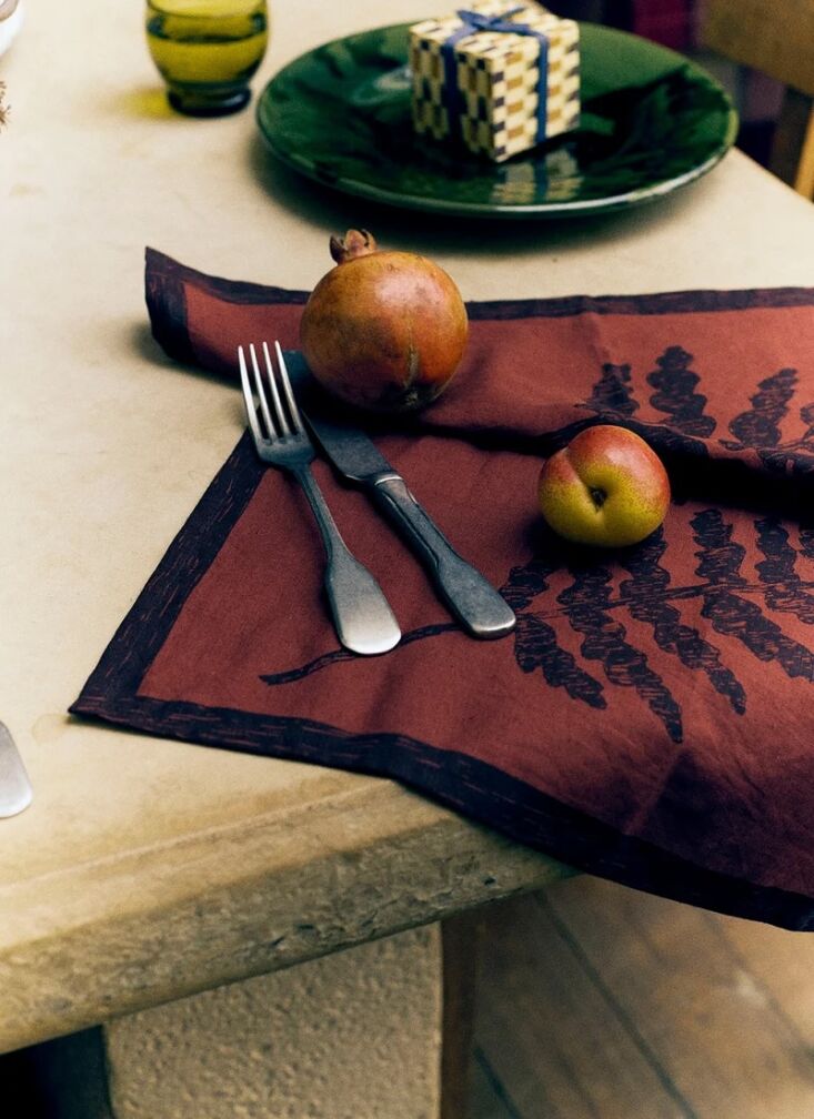 Annie loves these two-tone plum and rust napkins, marked with ferns. Shop now.