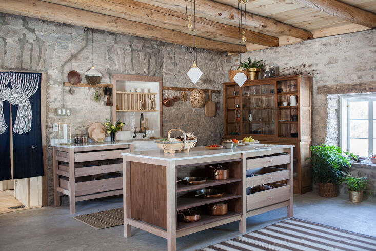 in their formerly abandoned stone farmhouse kitchen in ontario, canada, john ba 22