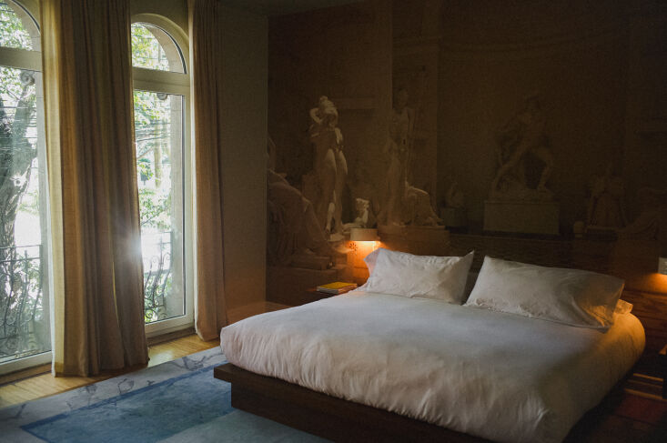 the guest rooms are designed with a unique photographic wallpaper using analog 22