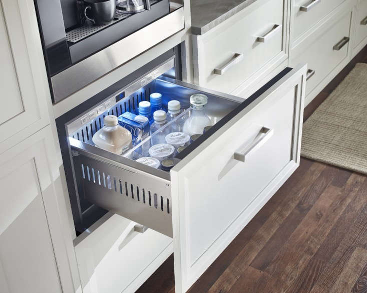 true drawers with overlay panels situated under a coffee station. 16
