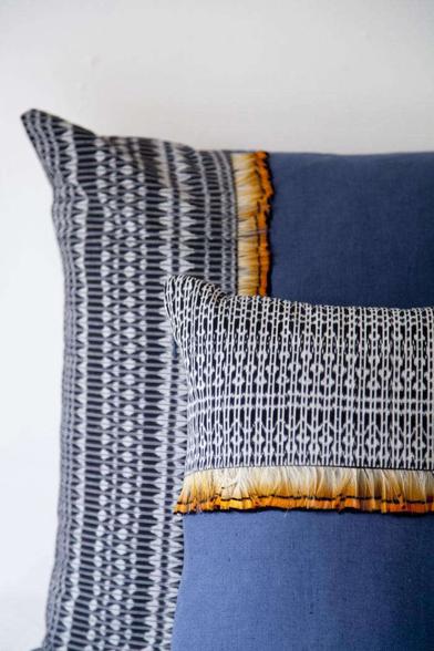 https://www.remodelista.com/ezoimgfmt/media.remodelista.com/wp-content/uploads/2015/03/img/sub/uimg/08-2012/700_feather-rebozo-pillows.jpg?ezimgfmt=rs:392x588/rscb4