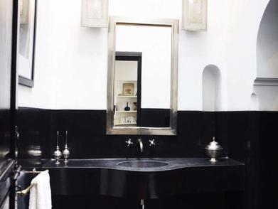 https://www.remodelista.com/ezoimgfmt/media.remodelista.com/wp-content/uploads/2017/02/lhotel-marrakech-jasper-conran-black-bathroom-silver-mirror-733x550.jpg?ezimgfmt=rs:392x294/rscb4