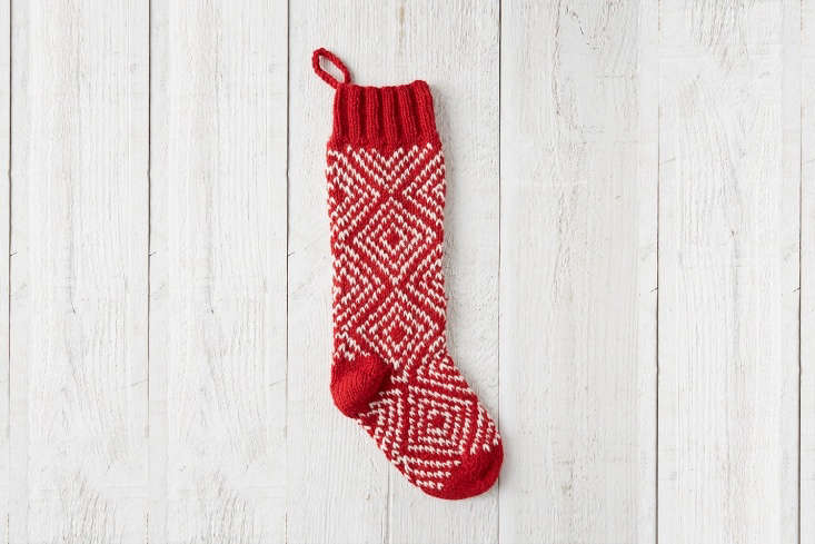 the terrain woolen diamond stocking in red is hand knit in nepal; $38 at terra 18