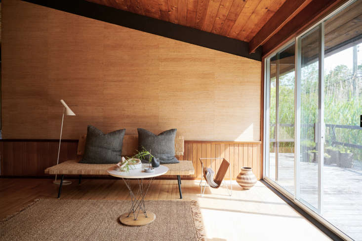 materials like clay, wood, and linen add nature inspired texture to a living ro 15