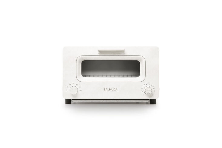 the compact balmuda toaster steam oven, shown in white, is \$\299 on amazon. fo 19