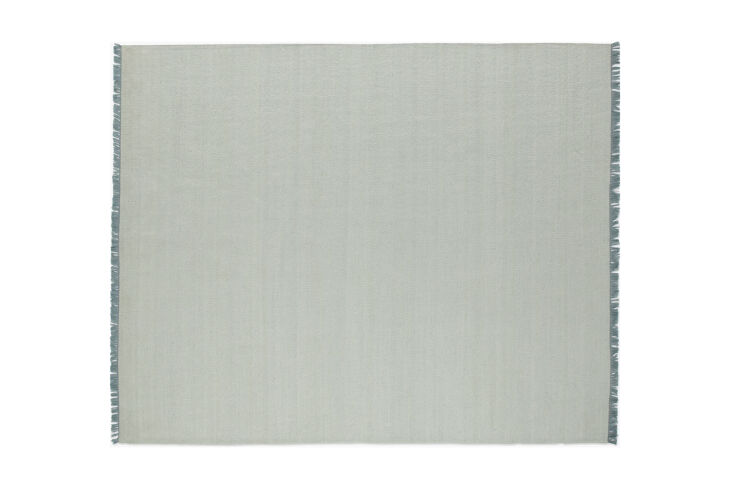 the design within reach indra indoor/outdoor rug, shown in tide, is \$695 for t 17