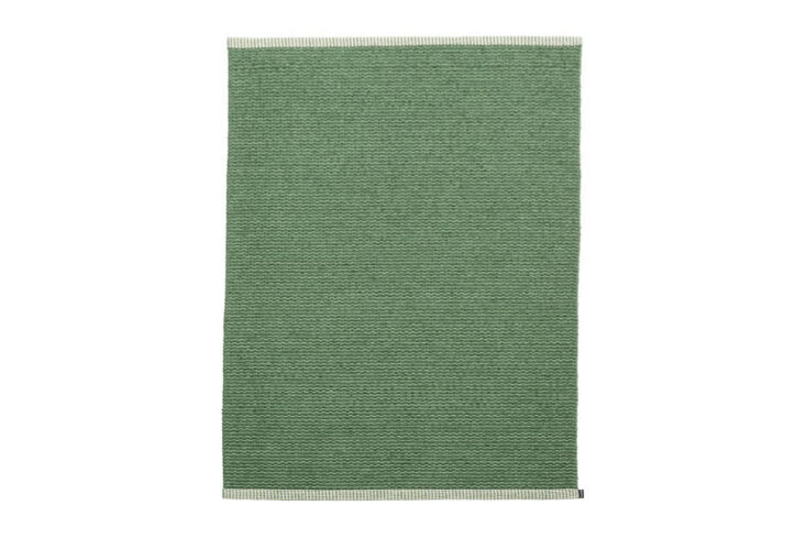 from swedish brand pappelina, the mono rug, shown in leaf, starts at \$\260 at  21