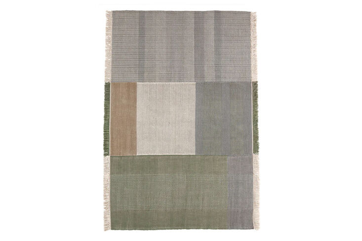 the trnk tres outdoor rug, shown in salvia, is made of recycled pet to adapt to 24