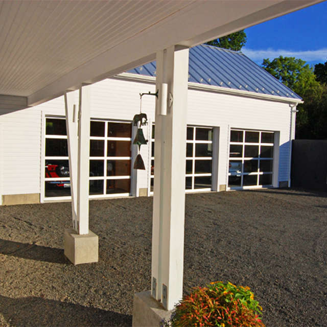 painter hill residence, roxbury, ct: view of garage from front door photo: andr 12