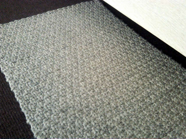 leviticus rug: hand knitted rug of wool, linen, and bamboo rayon. 25