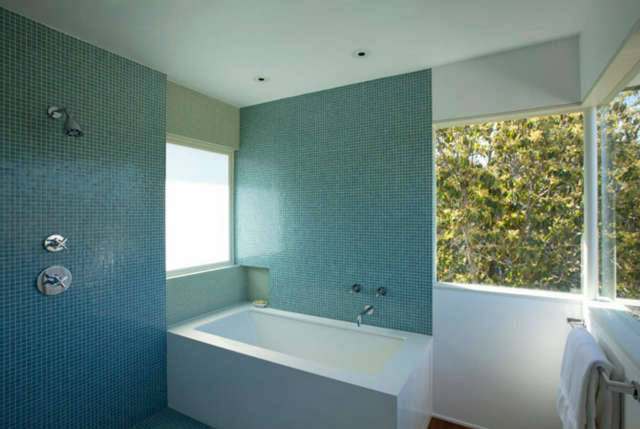 isaacson residence &#8\2\1\1; tile walls surrounding a shower and tub bathr 16