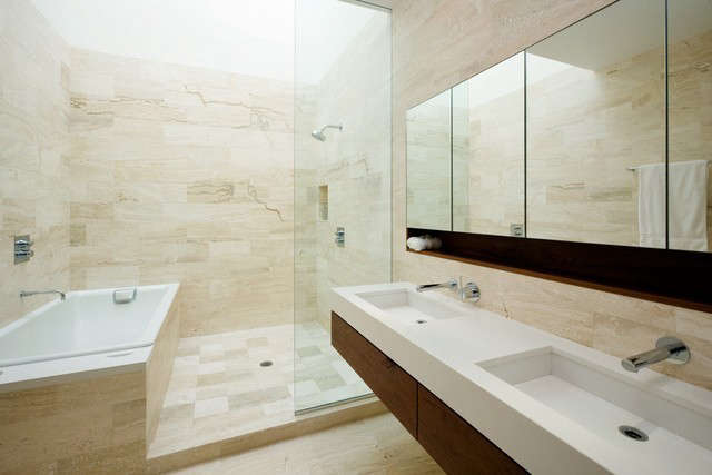 bathroom with skylight shaft: above the travertine shower/tub area, a shaft con 11