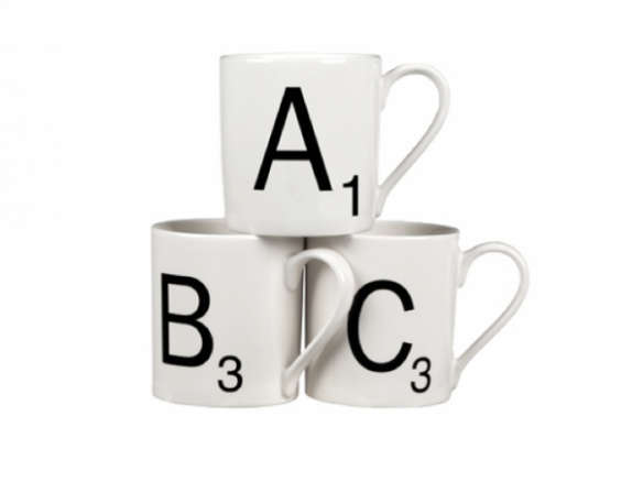 700 scrable mugs with black lettering  