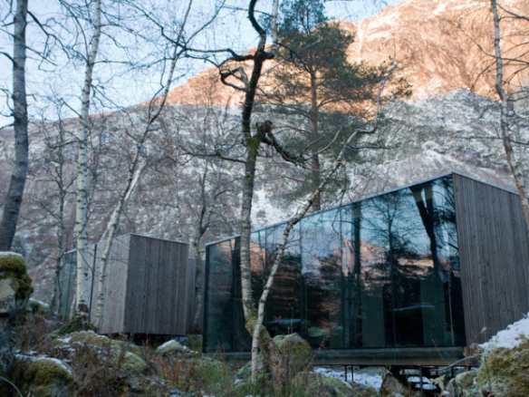 700 juvet landscape hotel in norway glass box wtih mountain views  