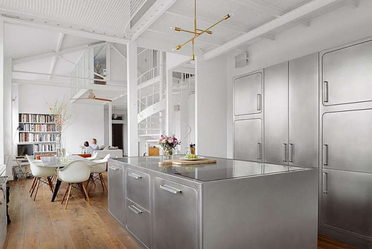 a loft in paris by festen architecture, with a kitchen featuring abimis compone 21