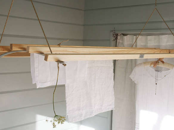 Remodelista Reconnaissance A Collapsible Drying Rack in a London Laundry Room portrait 31