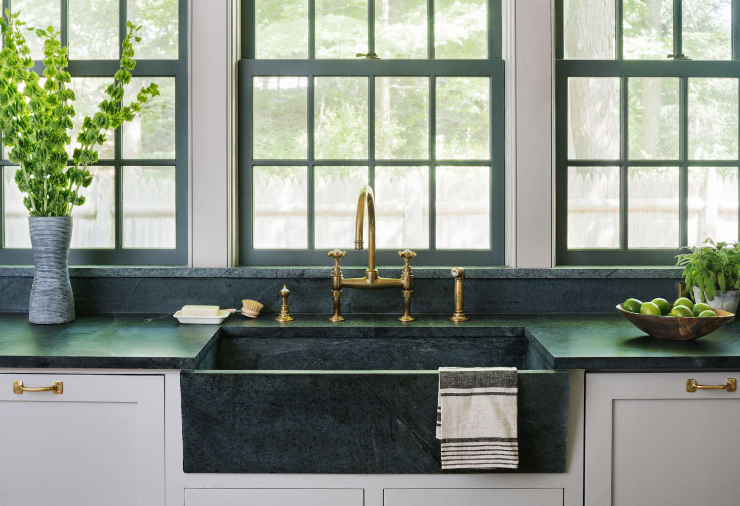 modern farmhouse renovation with soapstone counters and integrated sink 22