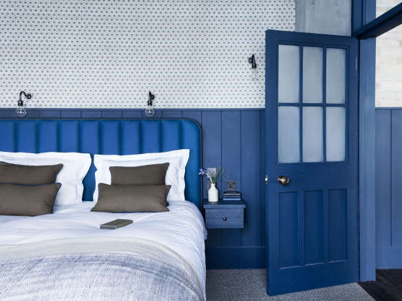 Mark Lewis Interior Design Hoxton Square loft blue and white bedroom tongue and groove paneling Rory Gardener photo 12  