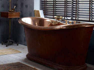 the water monopoly antique copper bath  