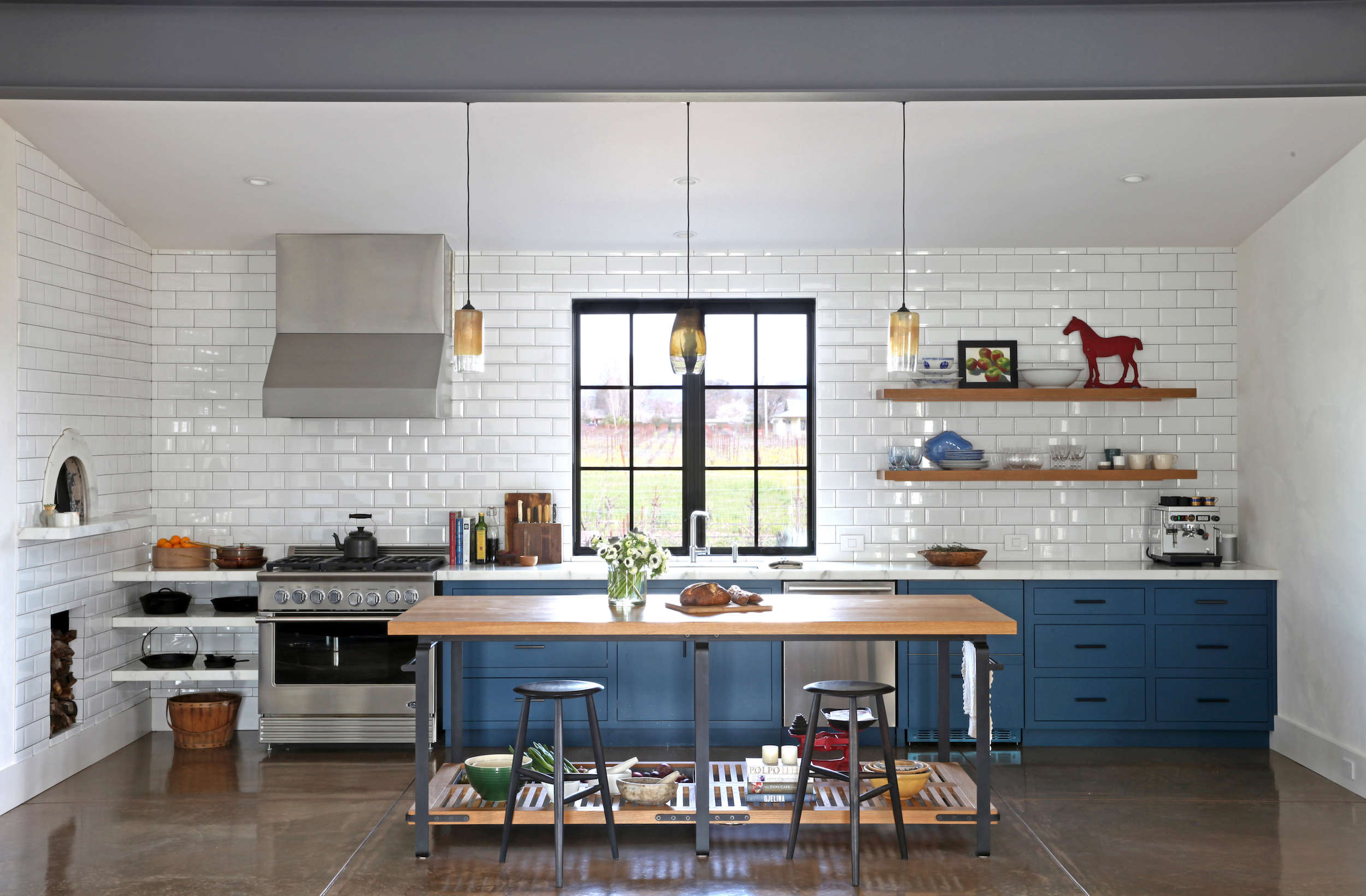 sonoma modern farmhouse kitchen white tile backsplash blue cabinets kitchen island